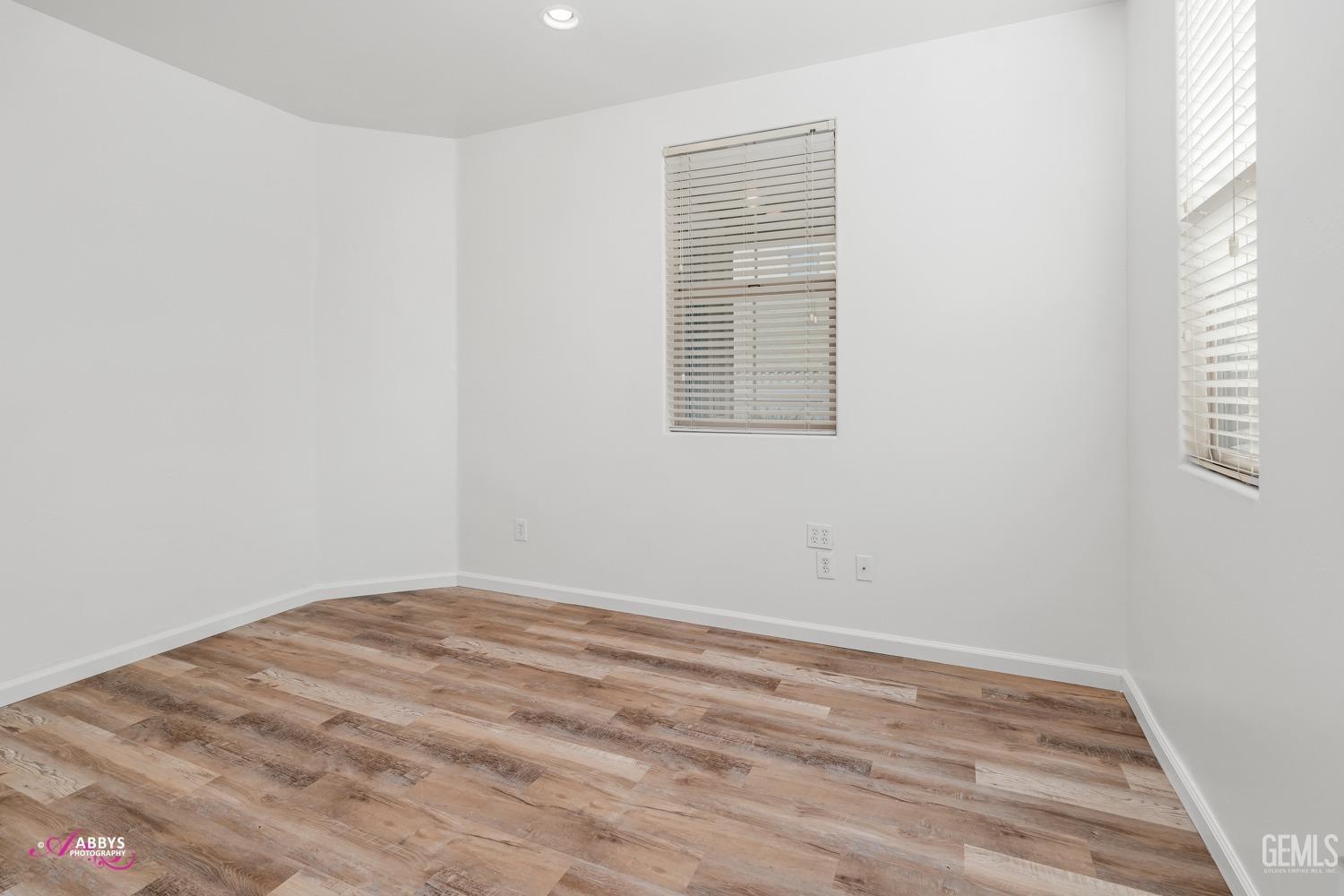 Undisclosed Address Bakersfield, CA 93312 - Photo 21 of 44 a view of an empty room with a window