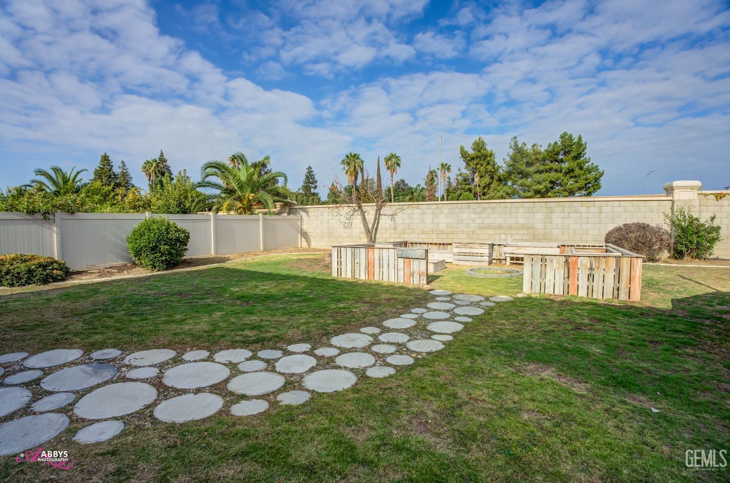 Undisclosed Address Bakersfield, CA 93312 - Photo 40 of 44 a view of yard with swimming pool