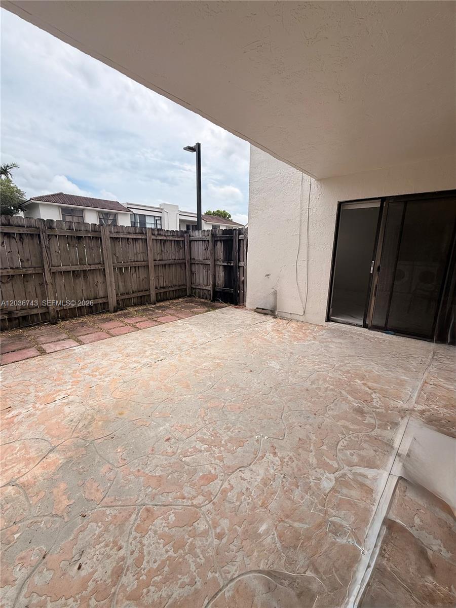 10875 Northwest 7th Street, Unit 1136 Miami, FL 33172 - Photo 22 of 25 a view of a backyard