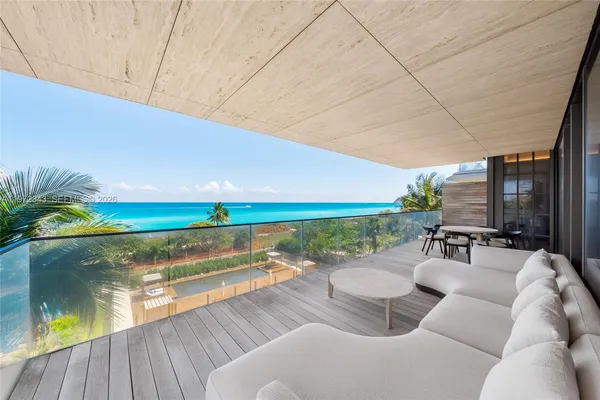 a view of swimming pool with outdoor seating