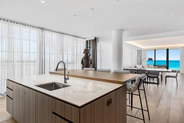 a dinning table and chairs in a room