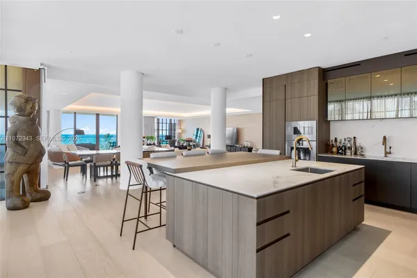 a view of a living room and a kitchen