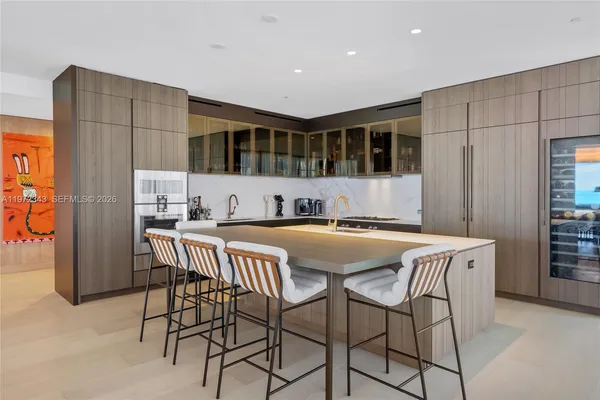a view of a lobby with furniture and floor to ceiling window