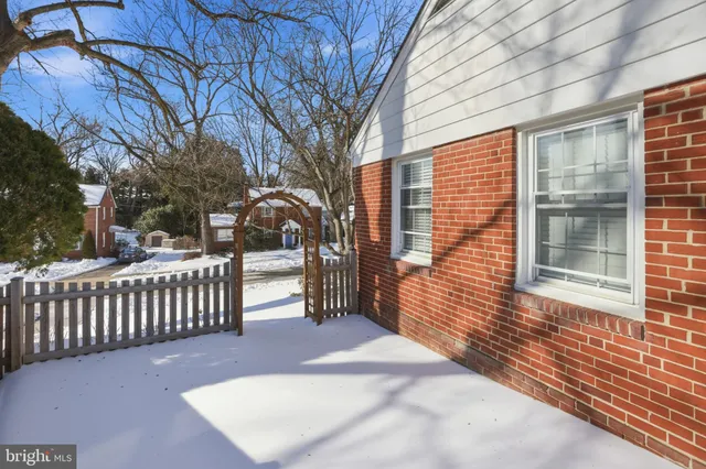 a street view with a snow on the road