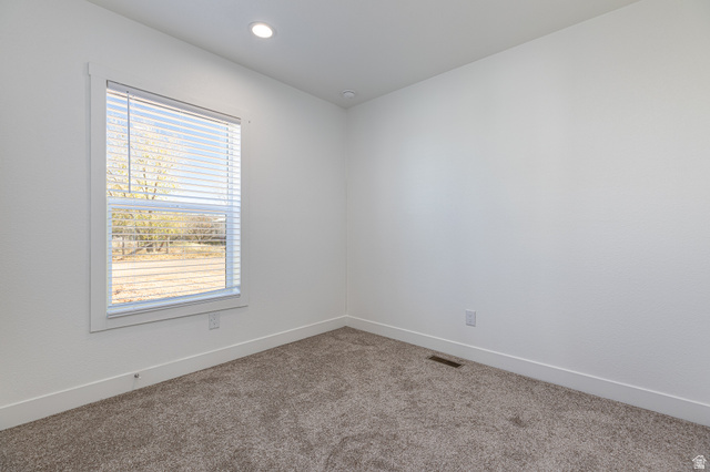 749 Riddle Drive Fredonia, AZ 86022 - Photo 27 of 41 Unfurnished room with carpet floors and recessed lighting