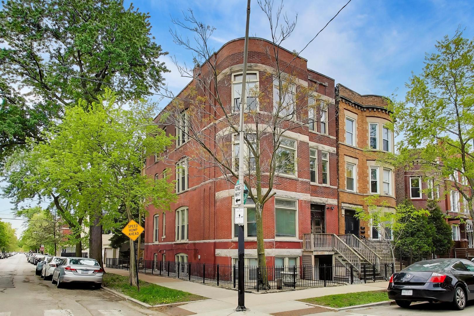 2701 West Haddon Avenue Chicago, IL 60622 - Photo 1 of 22 a view of a parked cars in front of a building