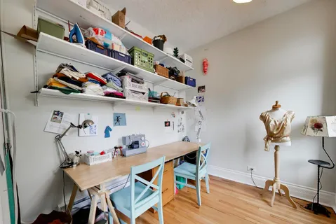 a room with furniture and wooden floor