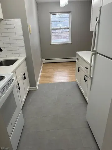 a view of utility room with washer and dryer