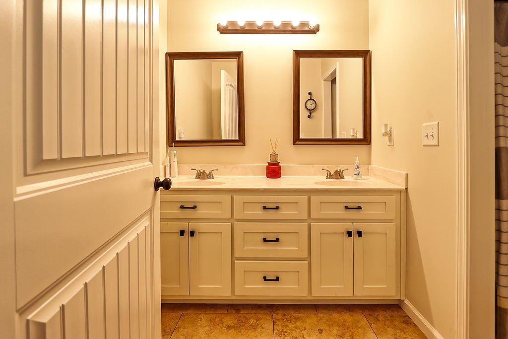 111 Heritage Hills Lane Hohenwald, TN 38462 - Photo 25 of 48 a bathroom with a sink and a mirror