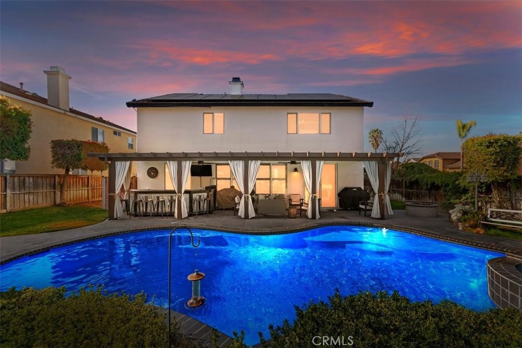 8402 Lindenhurst Street Riverside, CA 92508 - Photo 2 of 52 Back of Home at Twilight