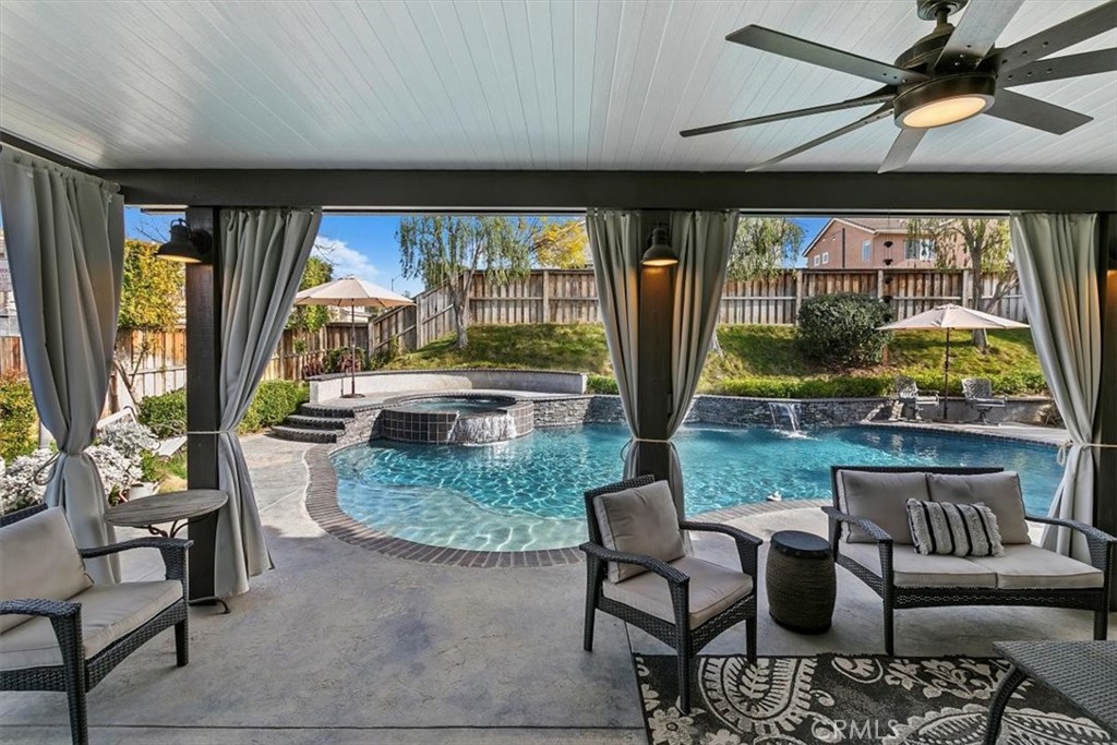 8402 Lindenhurst Street Riverside, CA 92508 - Photo 3 of 52 Covered Patio with Lights, TV and Ceiling Fans