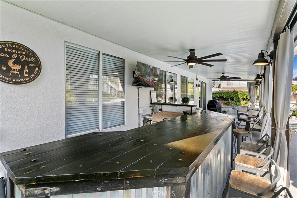 8402 Lindenhurst Street Riverside, CA 92508 - Photo 39 of 52 Covered Patio with Long Bar Top