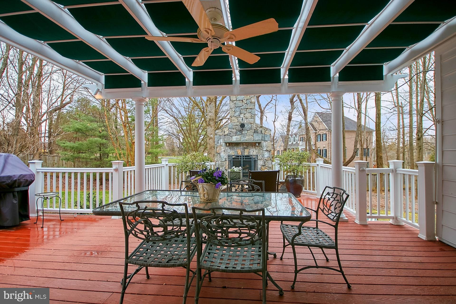 734 Springvale Road Great Falls, VA 22066 - Photo 27 of 30 Delightful retractable awning for al fresco dining