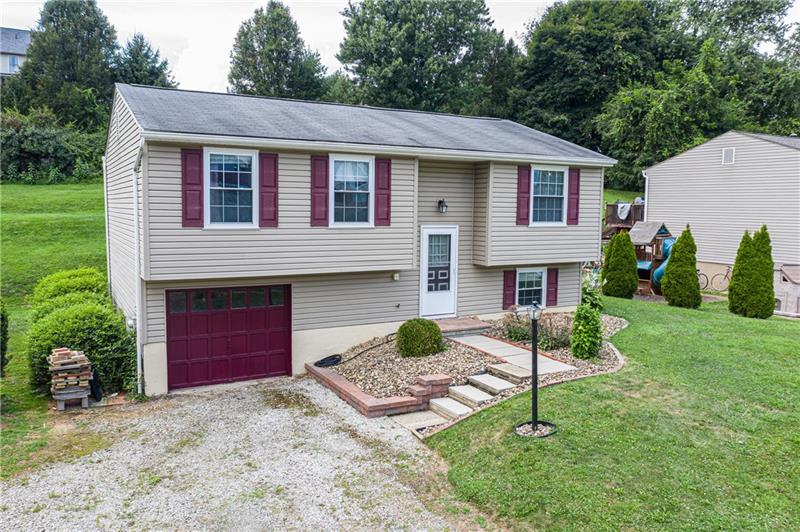 133 Old Ridge Road Coraopolis, PA 15108 - Photo 2 of 23 This exterior of this attractive split entry home features newer siding, gutters, soffit and fascia. It offers plenty of parking in the double wide driveway in addition to the integral garage.
