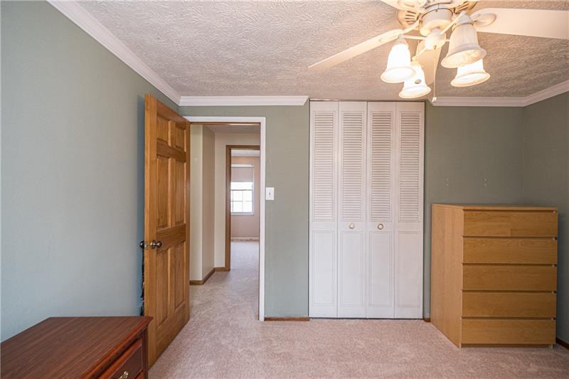 133 Old Ridge Road Coraopolis, PA 15108 - Photo 13 of 23 A view of the master bedroom out into the hallway with a glimpse of bedroom #3.