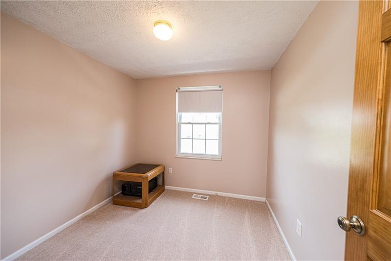 133 Old Ridge Road Coraopolis, PA 15108 - Photo 16 of 23 Bedroom #3 offers a neutral paint and new carpet and an overhead light.