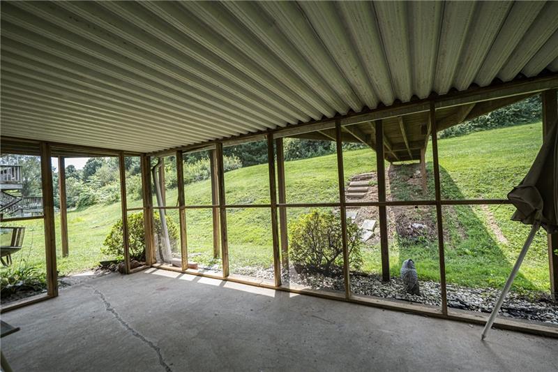 133 Old Ridge Road Coraopolis, PA 15108 - Photo 21 of 23 The covered patio off of the finished game room.