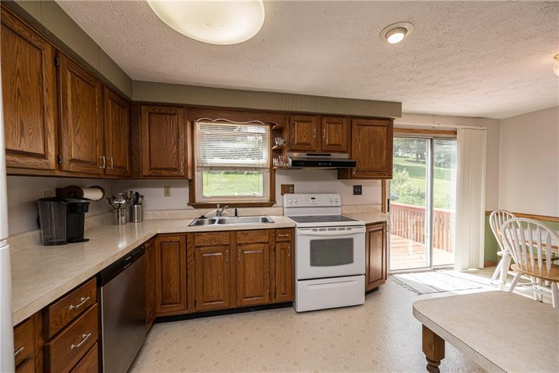 133 Old Ridge Road Coraopolis, PA 15108 - Photo 7 of 23 The kitchen offers ample cabinet and counter space in addition to a multi-use area that can be for additional prep space, storage or eating area. This space is fully equipped with a new stainless steel dishwasher, smooth top electric stove, refrigerator, disposal, large double bowl sink, range hood and microwave.
