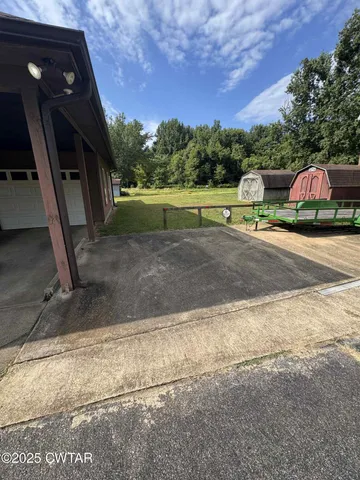 a view of outdoor space and yard