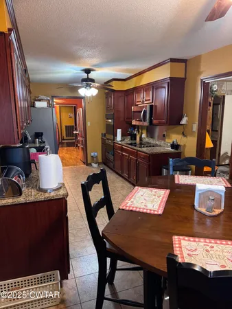 a view of a dining room with furniture