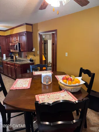 a view of a dining room with furniture