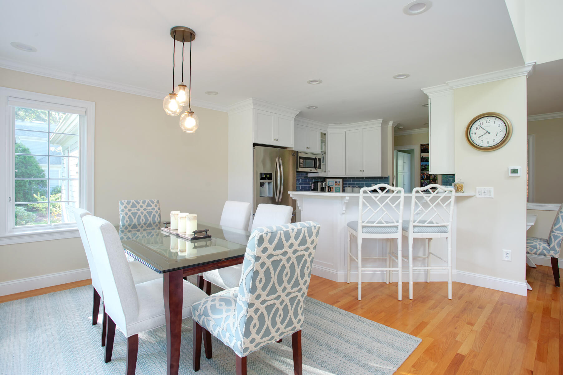 101 Reflection Drive Sandwich, MA 02563 - Photo 12 of 37 a view of a dining room with furniture window and wooden floor
