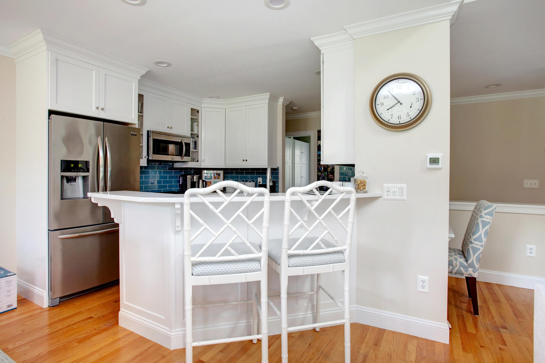 101 Reflection Drive Sandwich, MA 02563 - Photo 13 of 37 a kitchen with stainless steel appliances granite countertop a refrigerator a stove a sink and a refrigerator