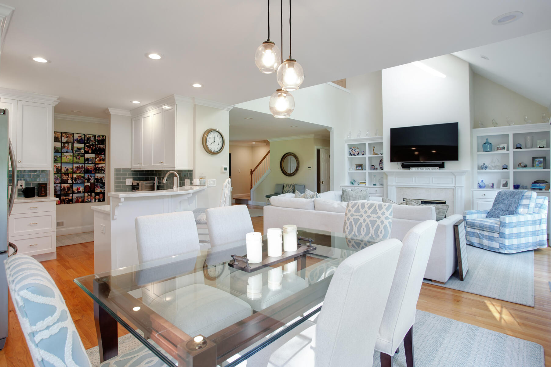 101 Reflection Drive Sandwich, MA 02563 - Photo 16 of 37 a living room with fireplace furniture and a flat screen tv
