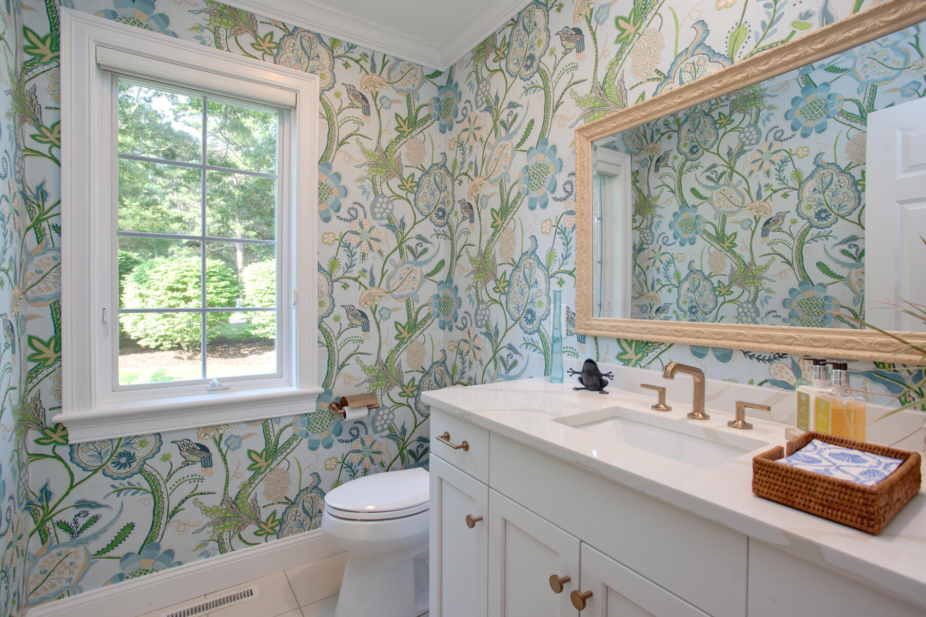 101 Reflection Drive Sandwich, MA 02563 - Photo 19 of 37 a bathroom with a granite countertop sink a toilet and a window