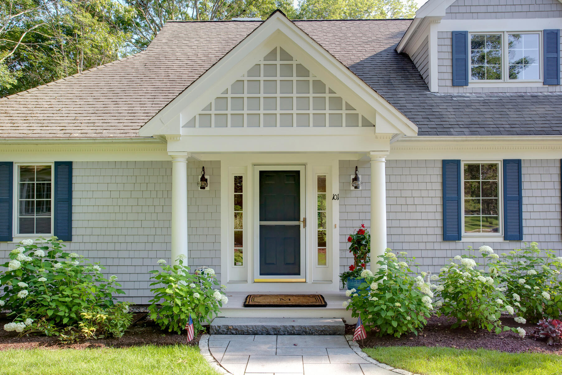 101 Reflection Drive Sandwich, MA 02563 - Photo 2 of 37 a front view of a house with a yard