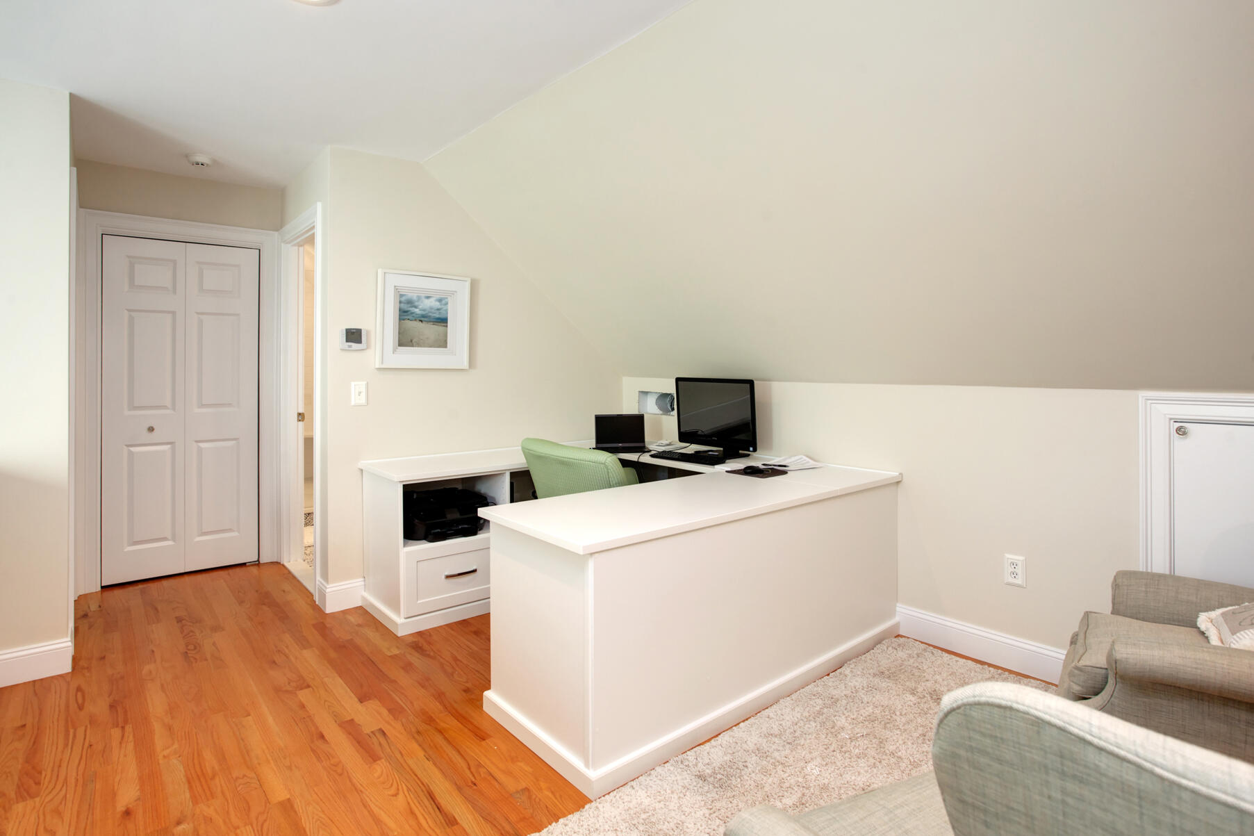 101 Reflection Drive Sandwich, MA 02563 - Photo 23 of 37 a bedroom with a bed and a couch