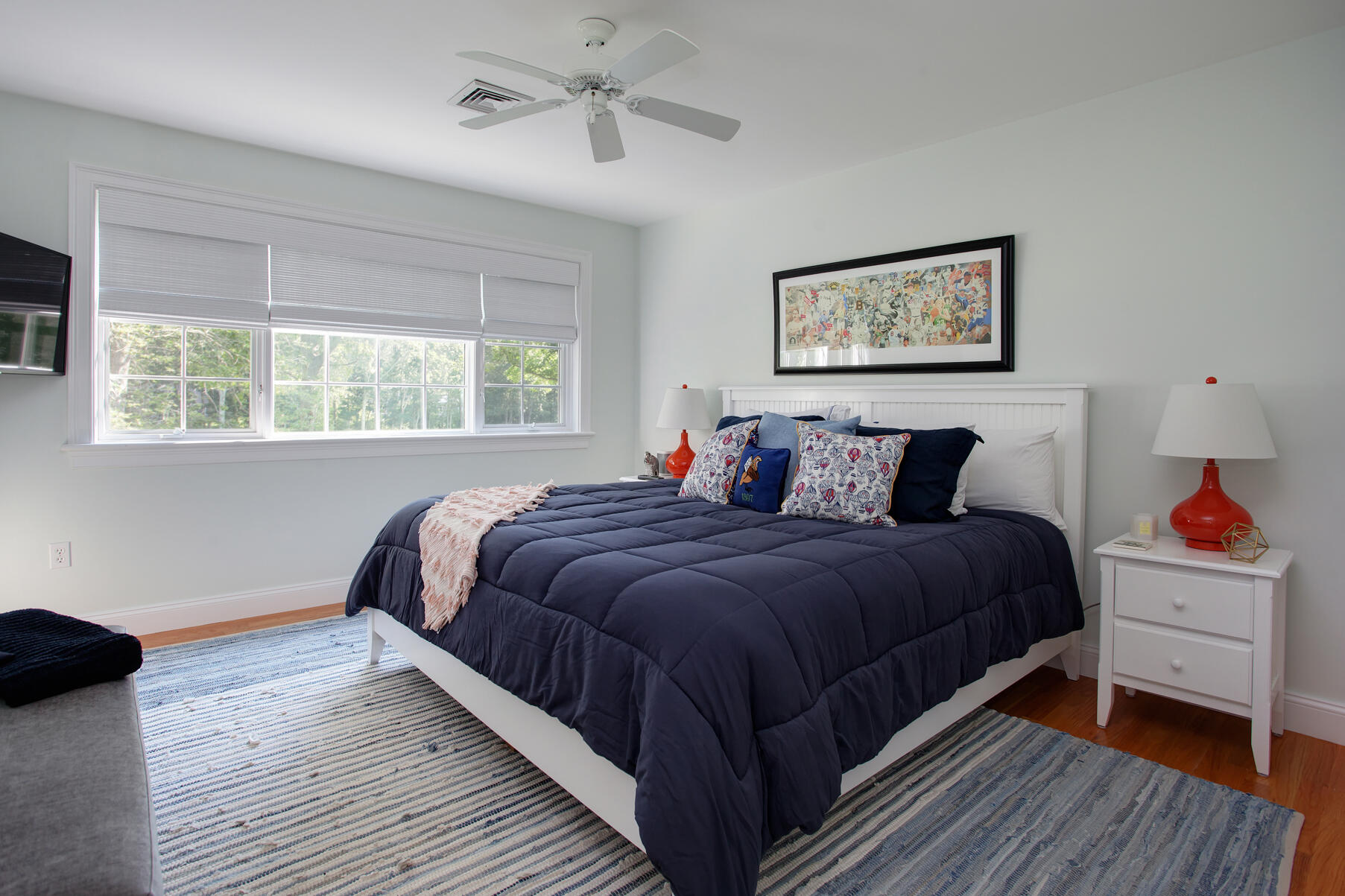 101 Reflection Drive Sandwich, MA 02563 - Photo 24 of 37 a bedroom with a bed and a large window