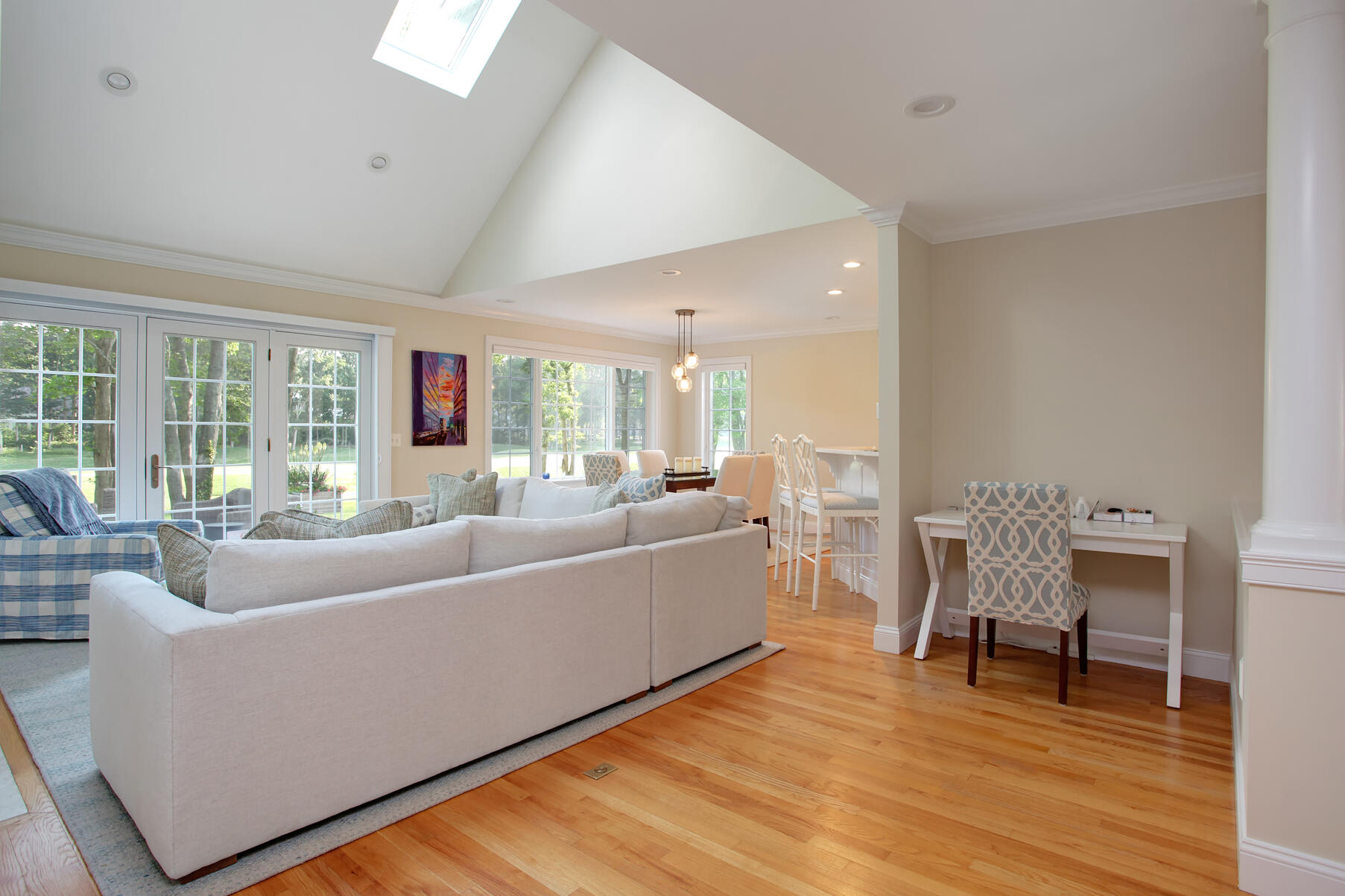 101 Reflection Drive Sandwich, MA 02563 - Photo 6 of 37 a living room with furniture and a wooden floor