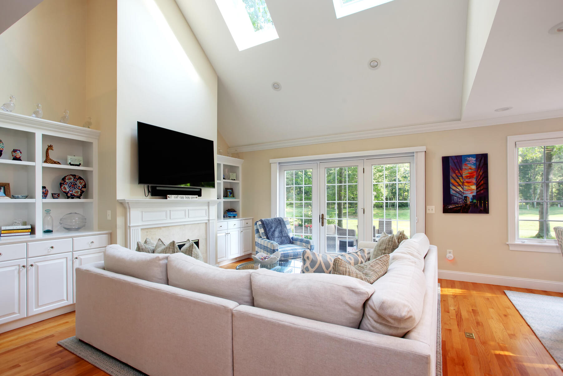 101 Reflection Drive Sandwich, MA 02563 - Photo 8 of 37 a living room with furniture and a flat screen tv