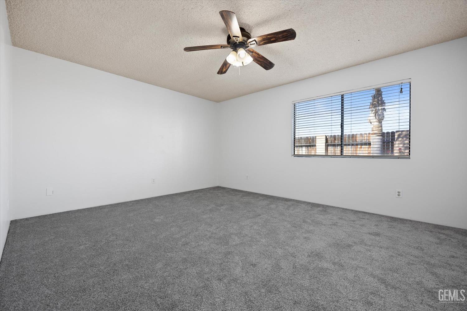 Undisclosed Address Taft, CA 93268 - Photo 18 of 36 a view of an empty room with a window