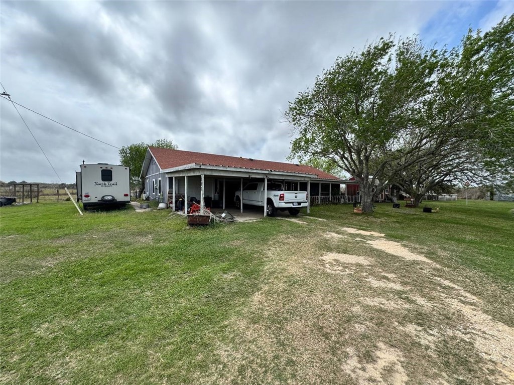 350 Quail Meadow Road Seadrift, TX 77983 - Photo 19 of 22 a front view of a house with a garden