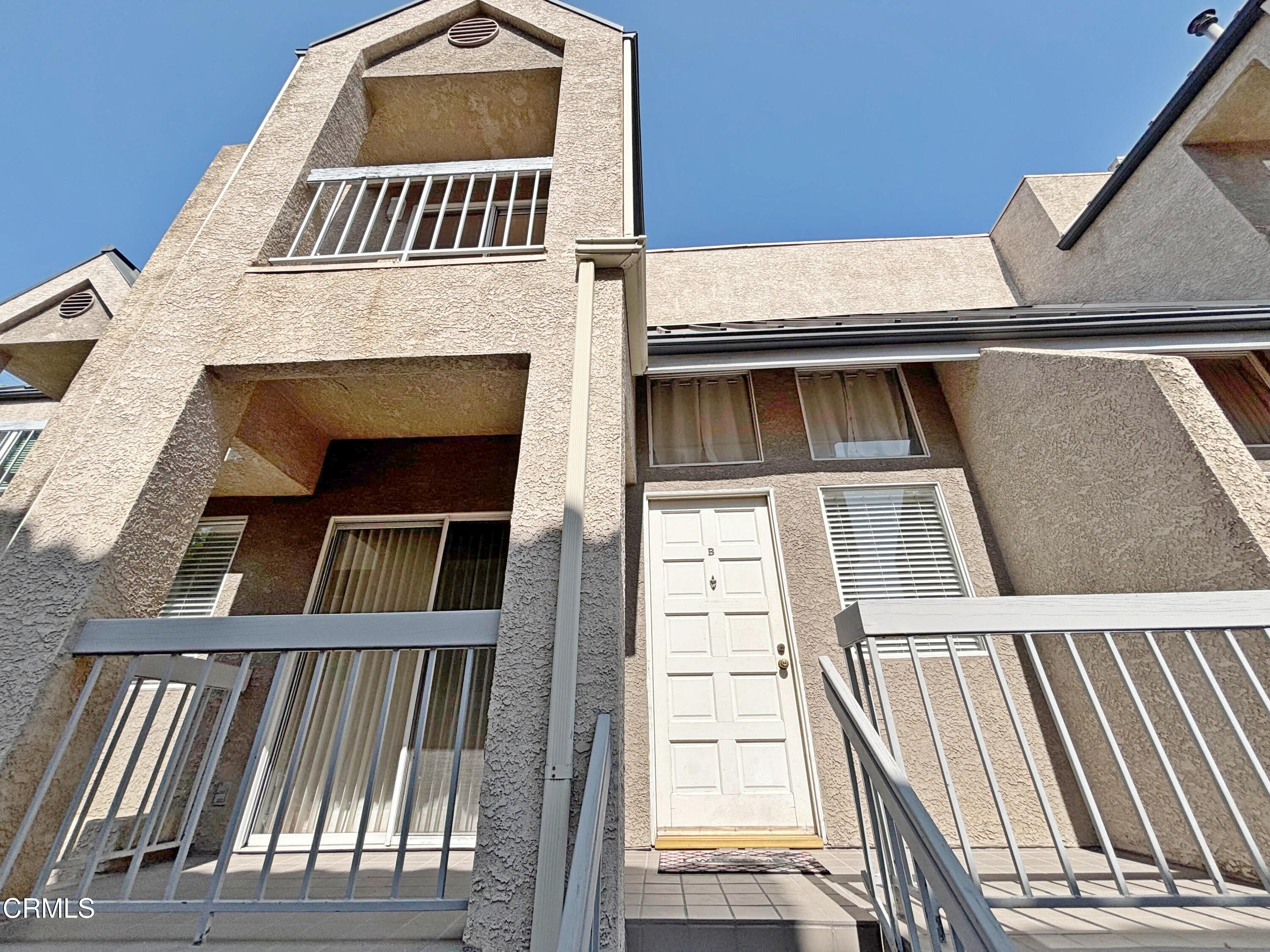 a view of a building with a balcony