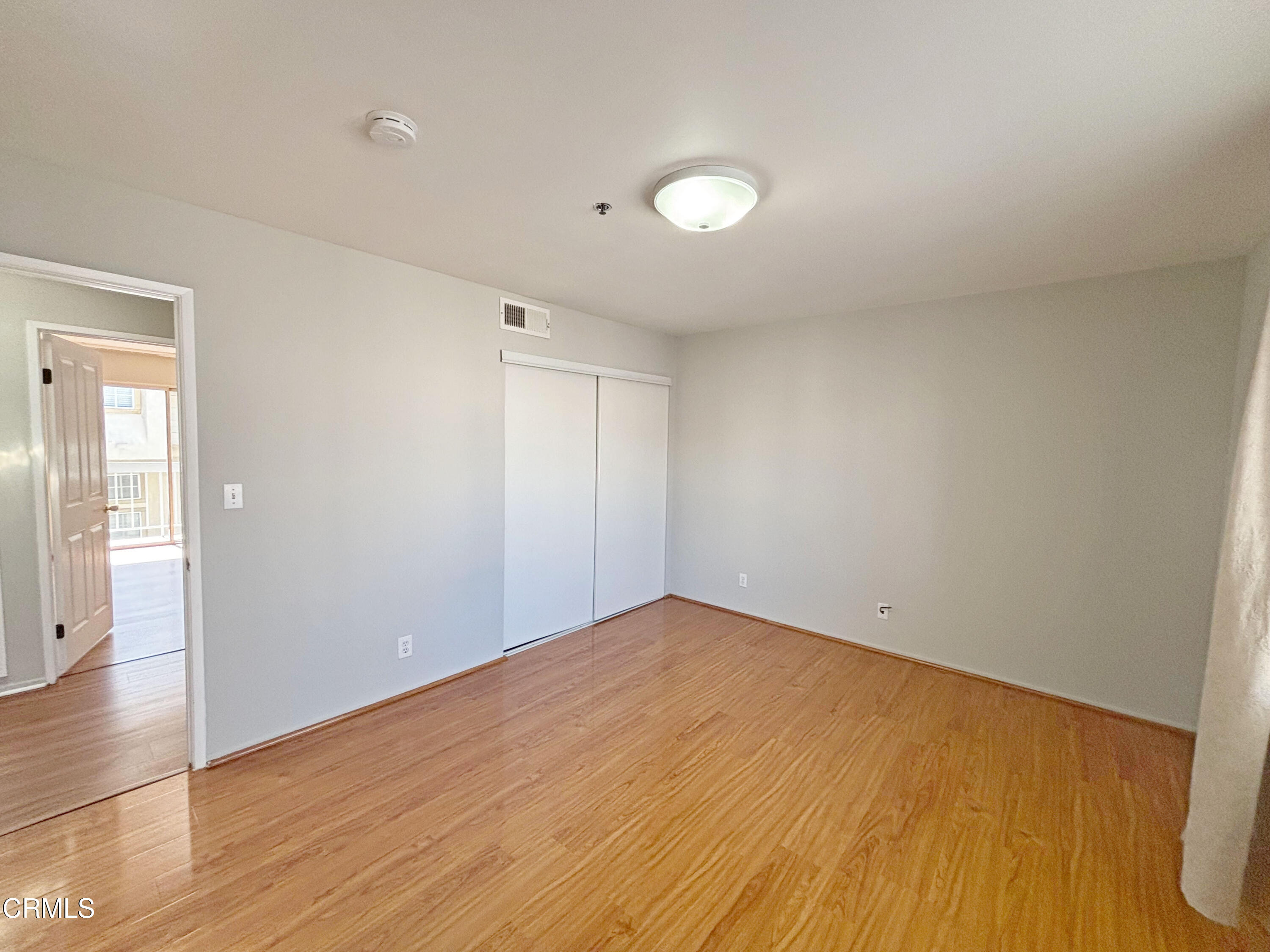 330 California Street, Unit B Arcadia, CA 91006 - Photo 13 of 18 an empty room with wooden floor and windows