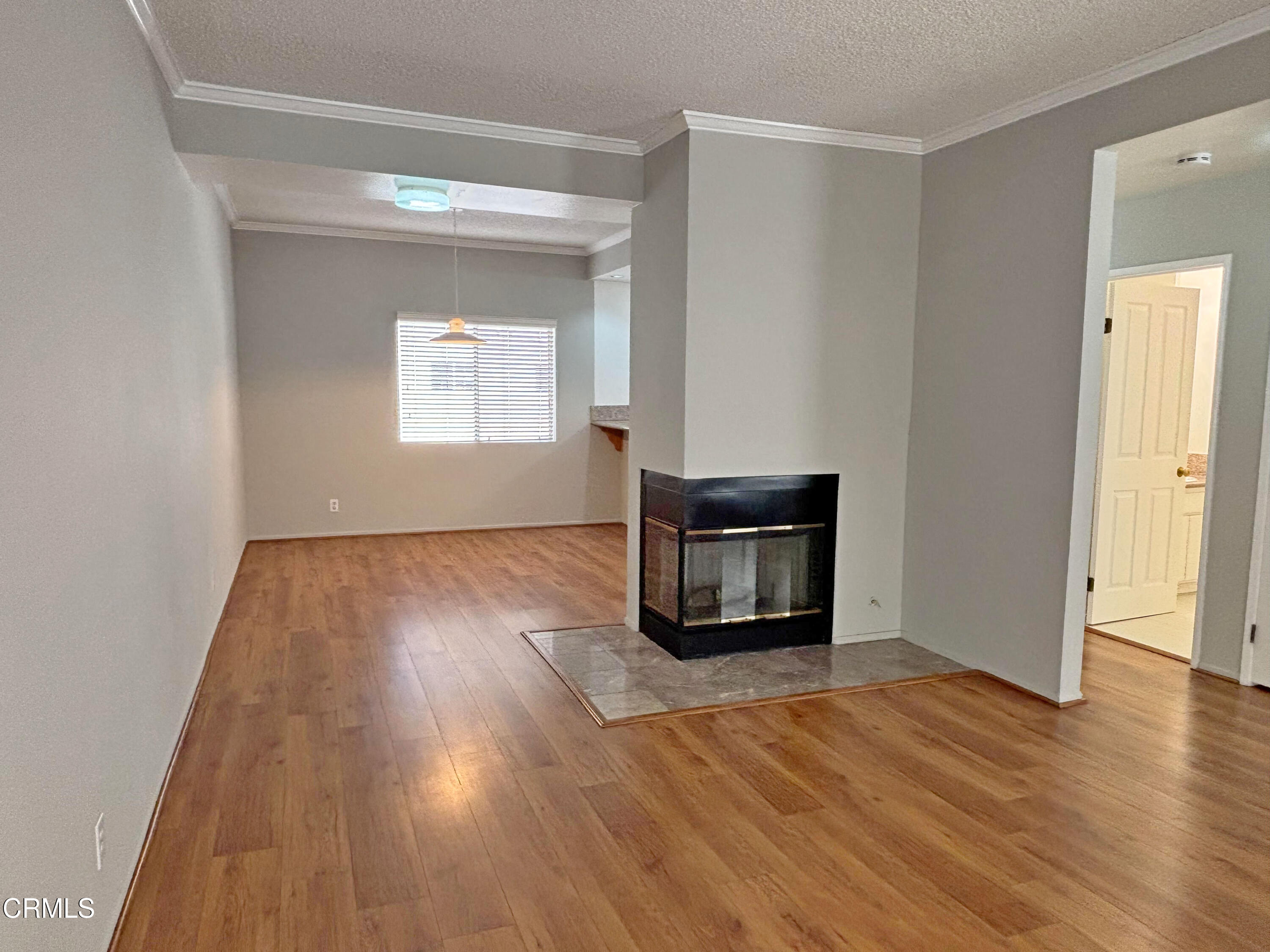 330 California Street, Unit B Arcadia, CA 91006 - Photo 2 of 18 a view of empty room with wooden floor