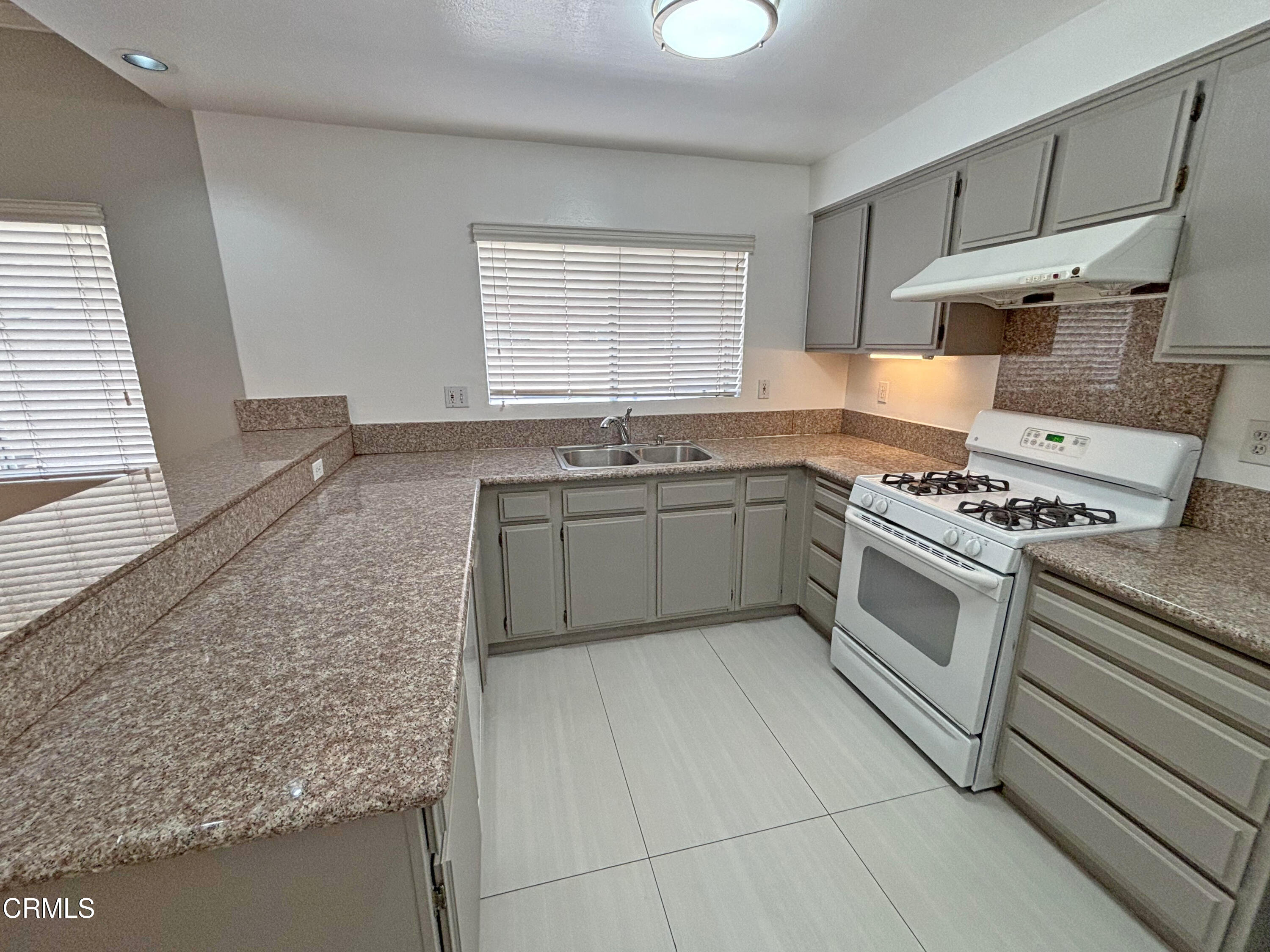330 California Street, Unit B Arcadia, CA 91006 - Photo 8 of 18 a kitchen with stainless steel appliances granite countertop a sink stove and cabinets