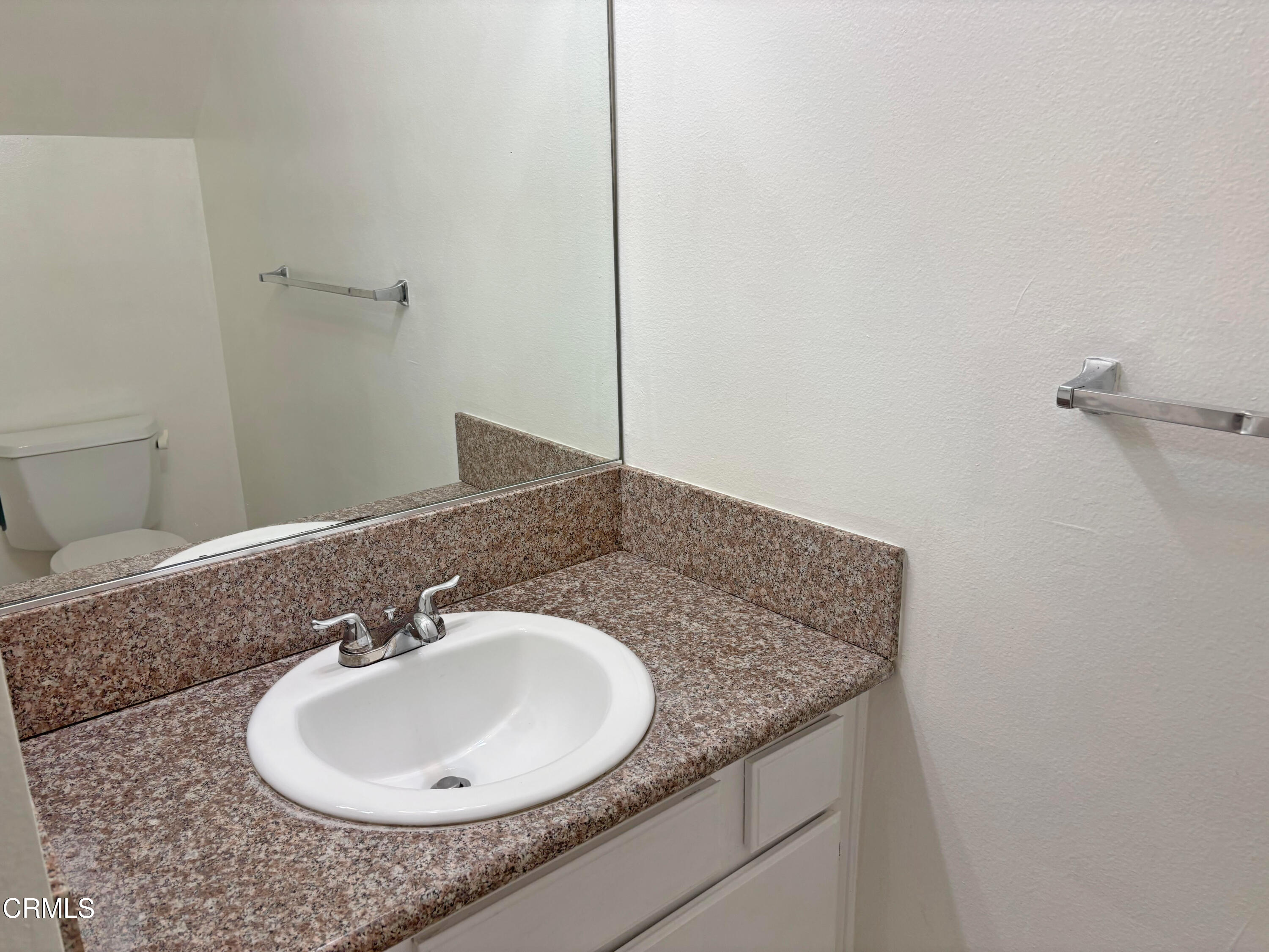 330 California Street, Unit B Arcadia, CA 91006 - Photo 9 of 18 a bathroom with a granite countertop sink and a mirror