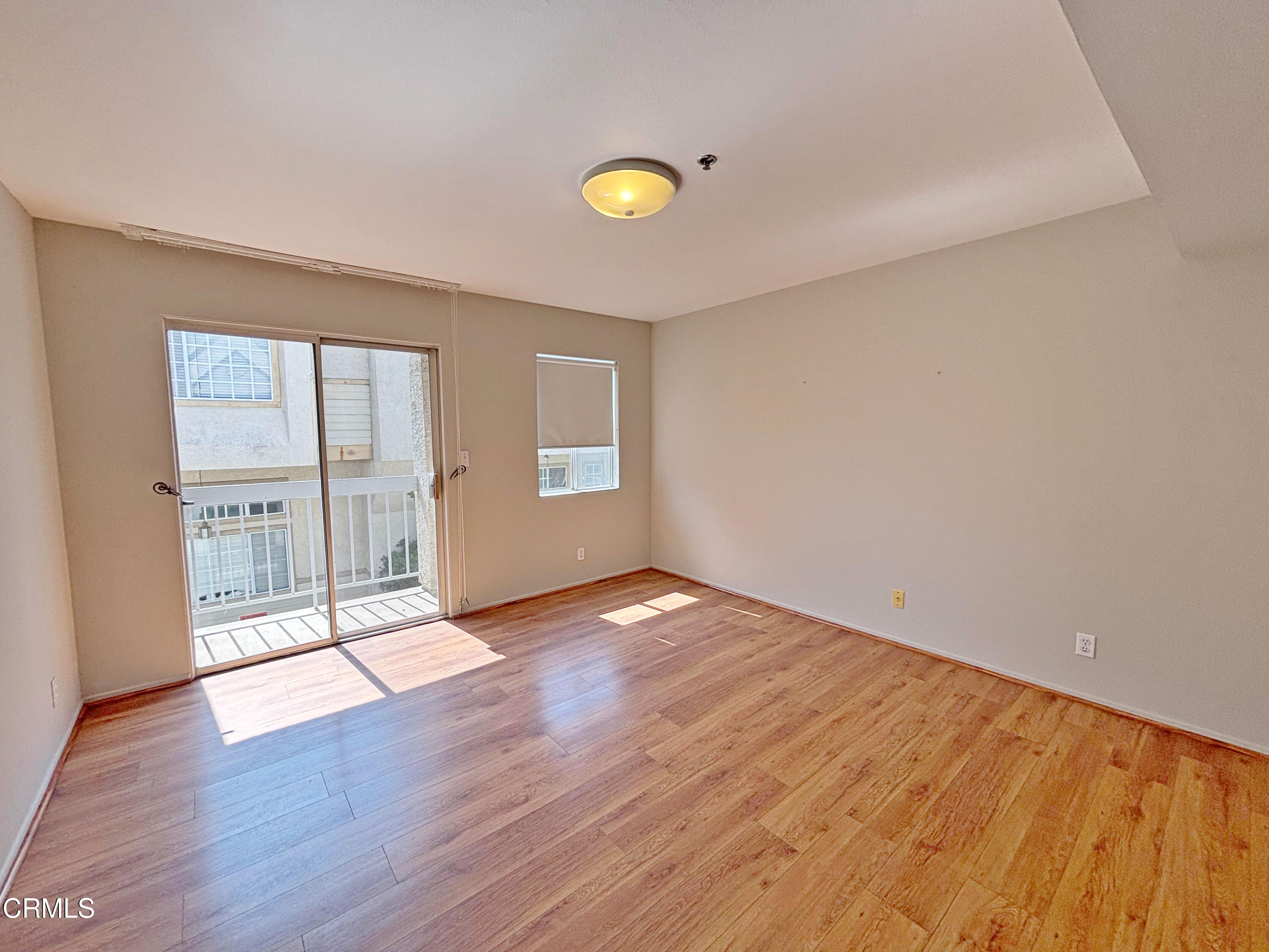 330 California Street, Unit B Arcadia, CA 91006 - Photo 10 of 18 an empty room with wooden floor and windows