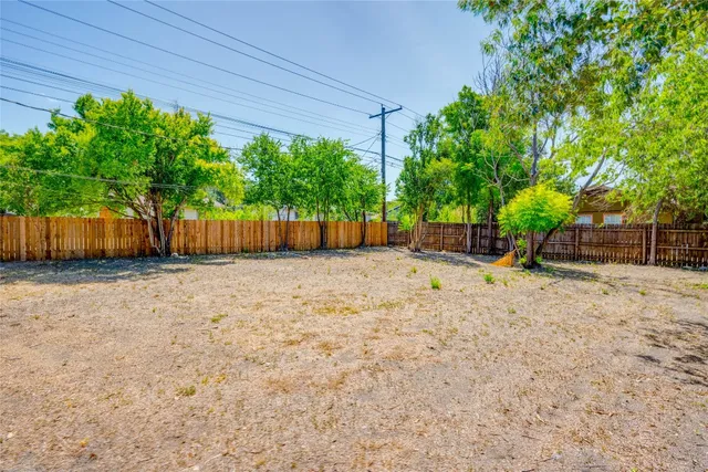 a view of a pathway with a patio