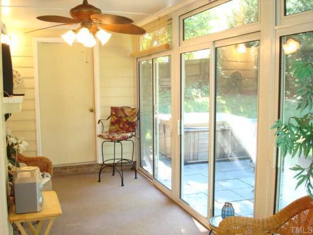 6648 Speight Circle Raleigh, NC 27616 - Photo 10 of 12 Sunroom off the back of the house brings the outdoors inside!