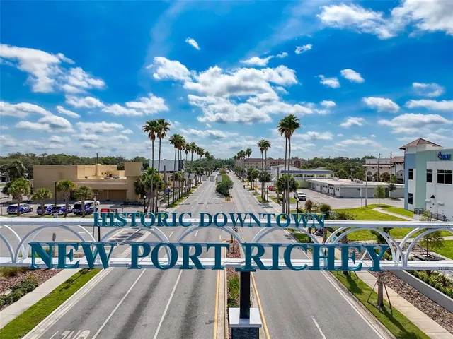 a view of an chairs and table in the balcony