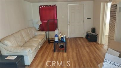 1414 Almond Street Chico, CA 95928 - Photo 3 of 11 a living room with furniture and wooden floor