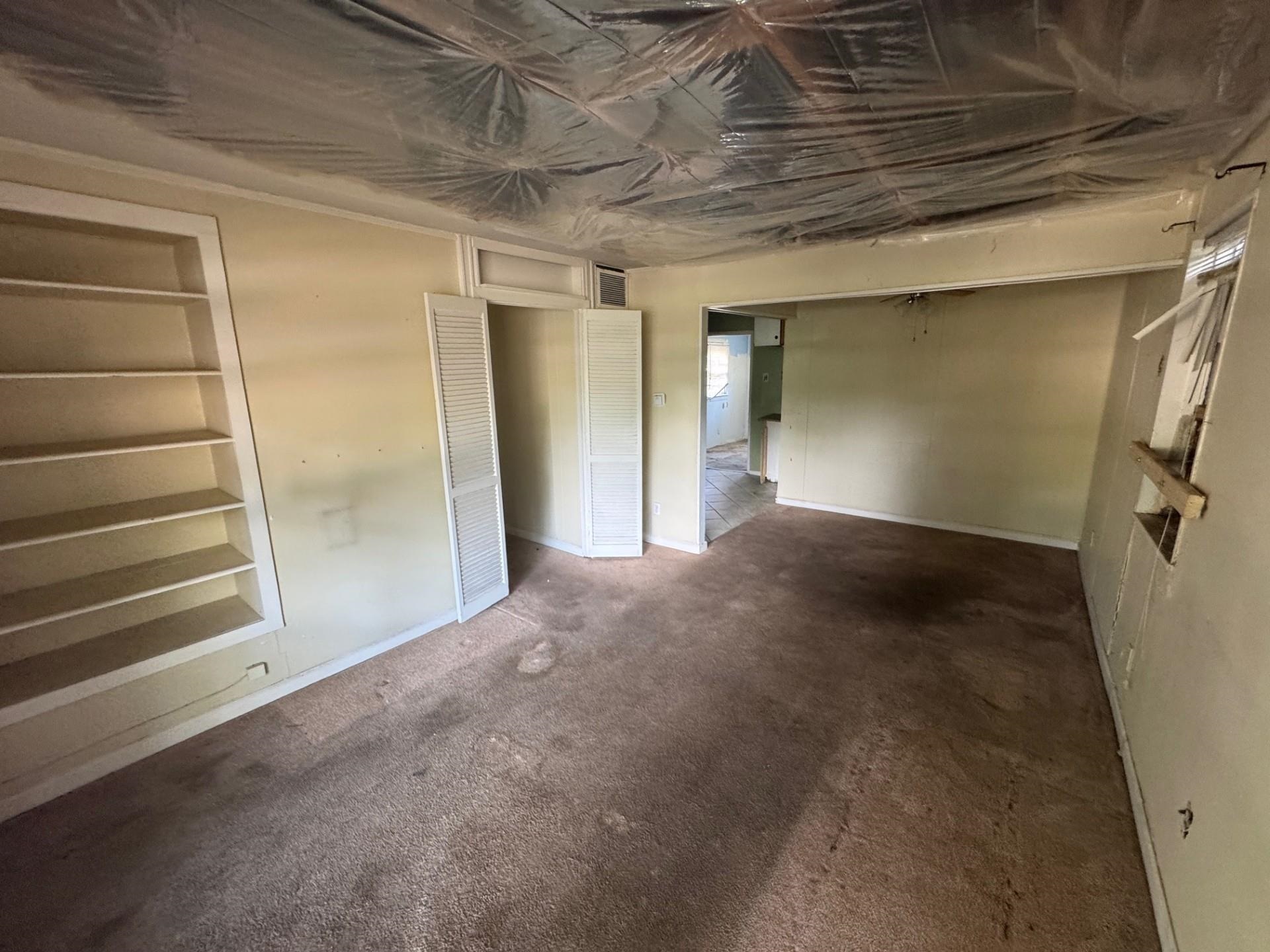 994 North Perkins Road Memphis, TN 38122 - Photo 11 of 15 Unfurnished bedroom featuring carpet and baseboards