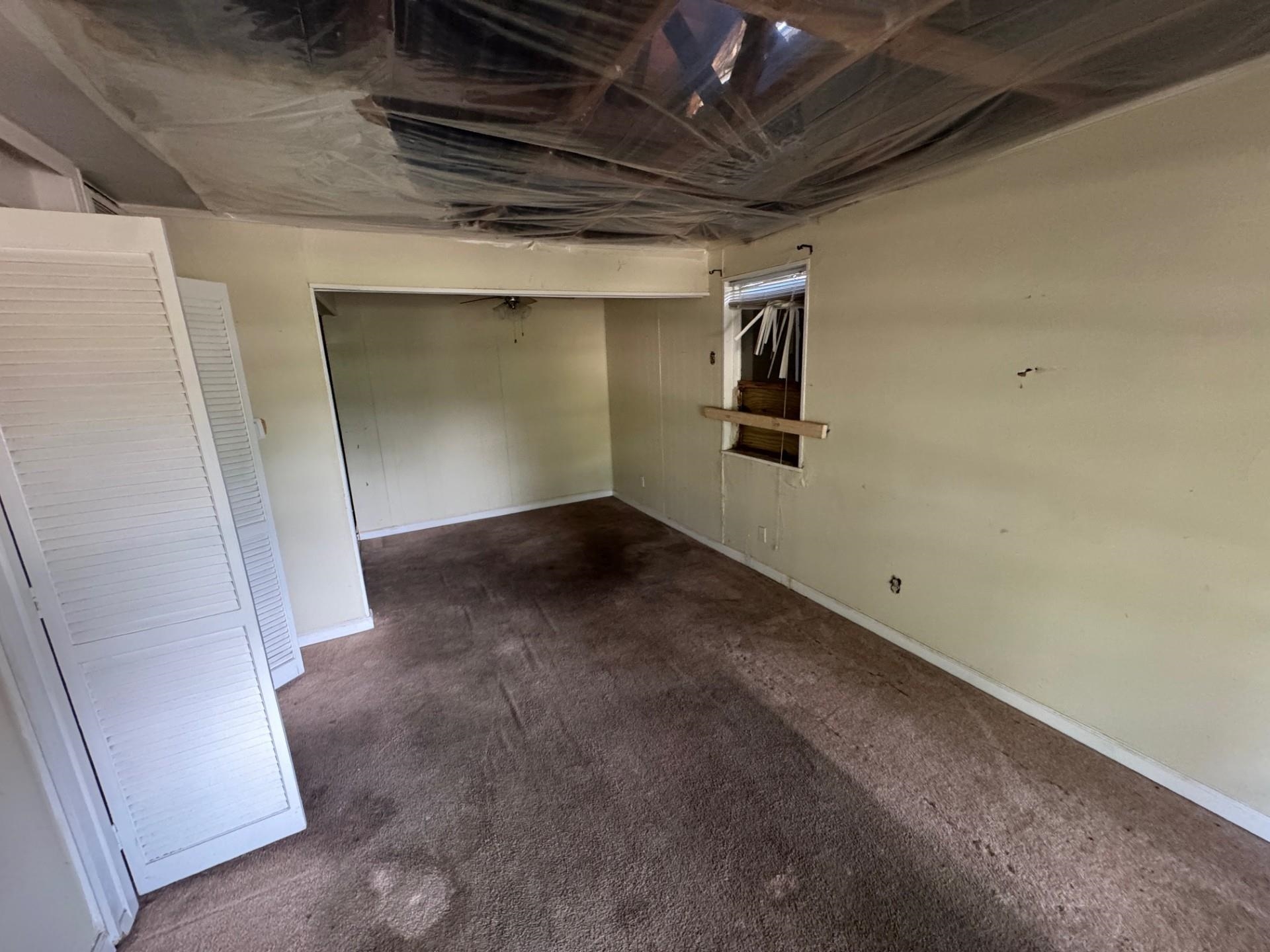 994 North Perkins Road Memphis, TN 38122 - Photo 2 of 15 Unfinished basement featuring carpet flooring and baseboards