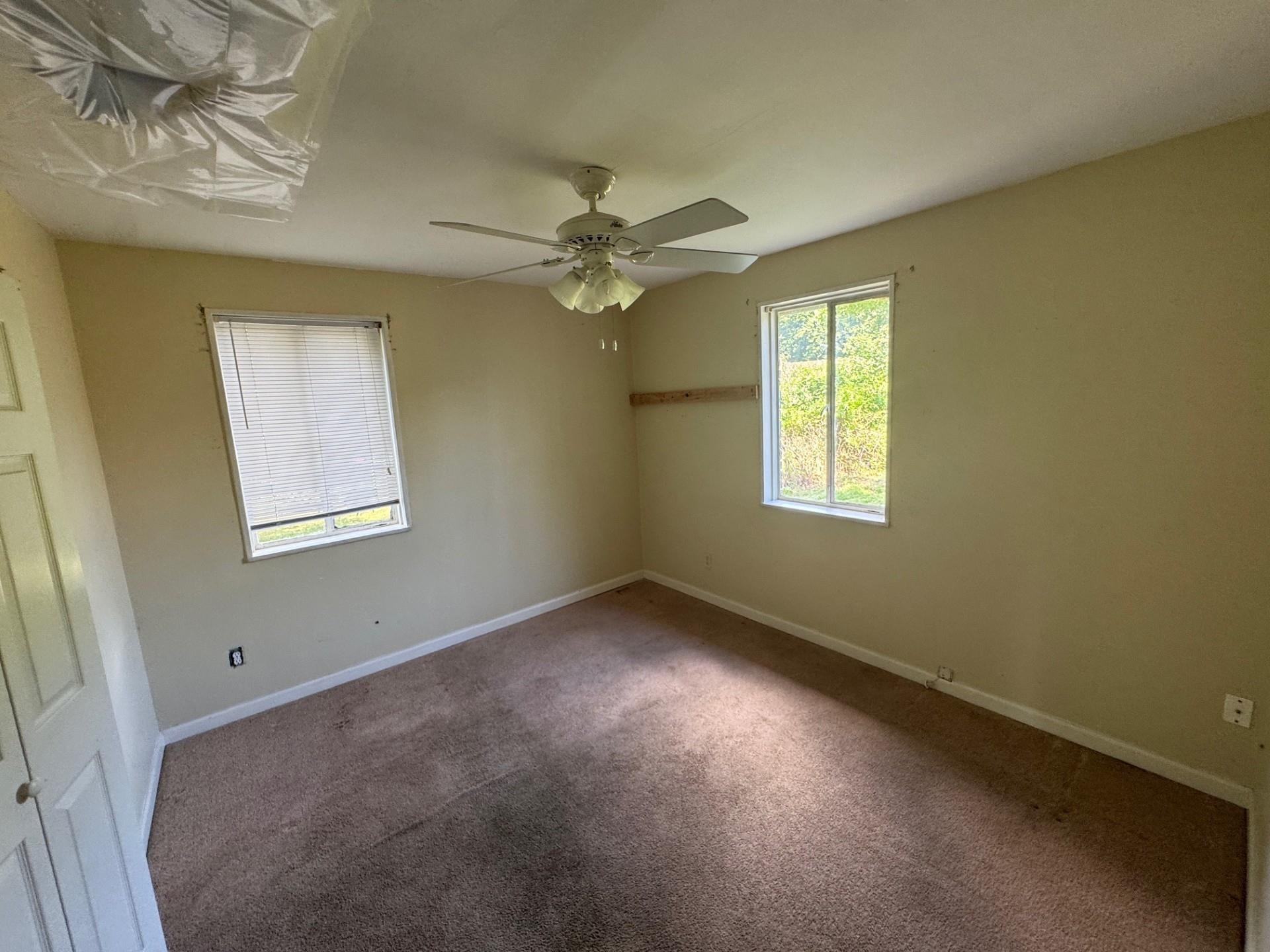 994 North Perkins Road Memphis, TN 38122 - Photo 8 of 15 Carpeted spare room featuring ceiling fan and baseboards