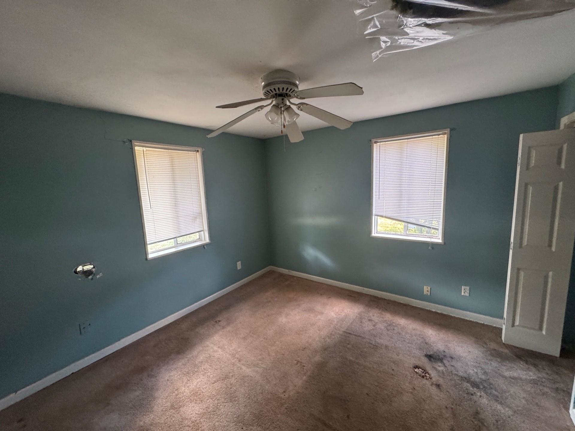 994 North Perkins Road Memphis, TN 38122 - Photo 9 of 15 Empty room with carpet flooring and ceiling fan
